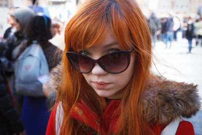 Close-up of young woman wearing sunglasses