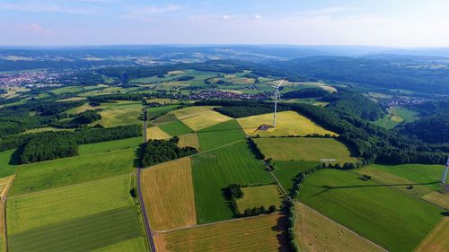 Aerial view of agricultural field against sky