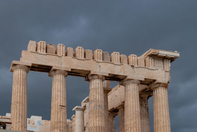 Low angle view of old ruins against sky