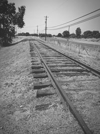 View of railroad tracks against clear sky