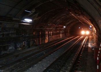 Railroad tracks in tunnel