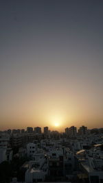 High angle view of townscape against sky during sunset