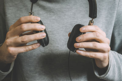 Close-up of man holding hands