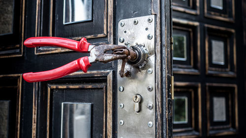 Close-up of plier on doorknob