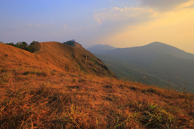 Scenic view of mountains against sky during sunset