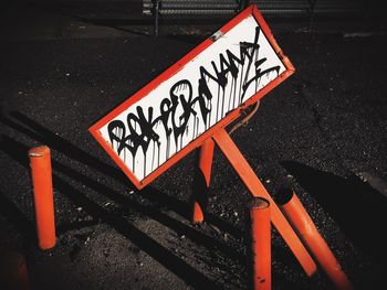 High angle view of information sign on road