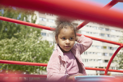 Girl having fun playing in playground