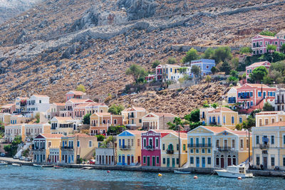 The traditional colorful houses and the port in symi island dodecanese, greece.