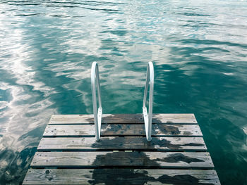 High angle view of wooden post in sea