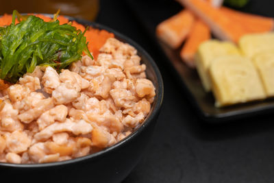 High angle view of chopped vegetables in bowl on table