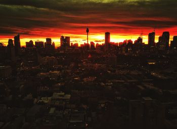 High angle view of buildings against sky during sunset