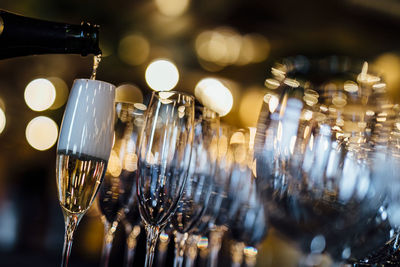 Pouring and serving champagne in a luxury social events like weddings and party.