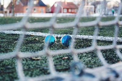 Close-up of soccer ball on field