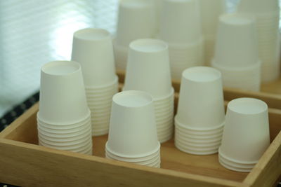 High angle view of coffee cups on table
