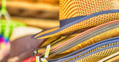Close-up of hats for sale at market