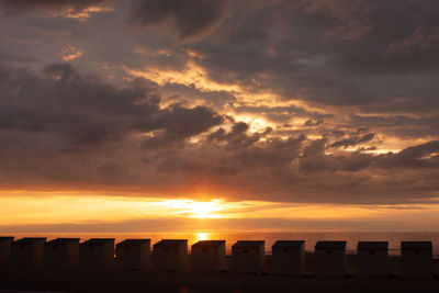 Scenic view of dramatic sky during sunset