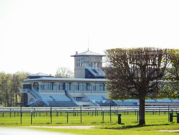 Built structure on field against clear sky