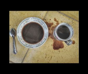 High angle view of coffee cup on table