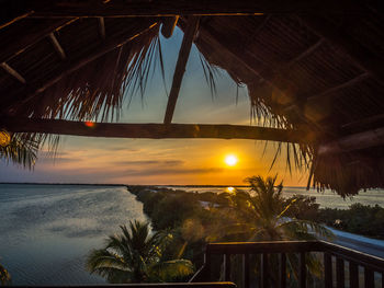 Scenic view of sea at sunset