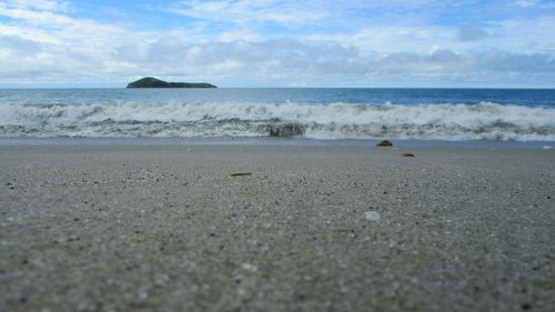 Scenic view of beach against sky