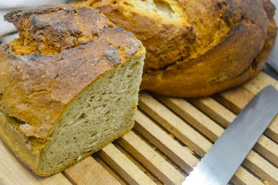 High angle view of bread on cutting board