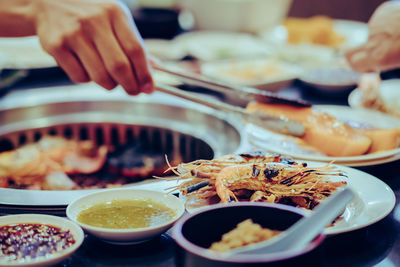 Close-up of person preparing food