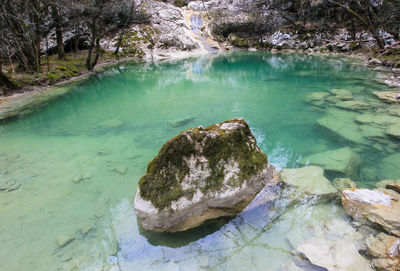 High angle view of rocks in river