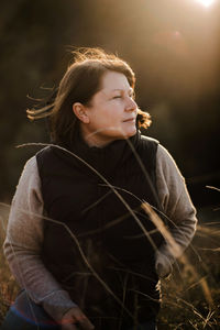 Beautiful portrait of a  stylish woman on a sunny day in autumn