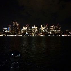 Illuminated cityscape at night