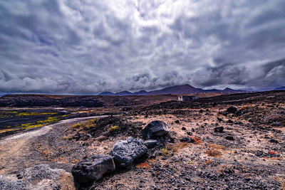 Scenic view of land against sky