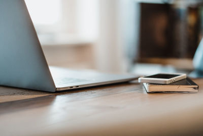 Close-up of laptop on table