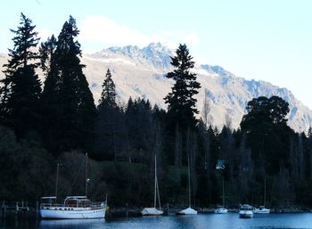 Scenic view of lake with mountains in background