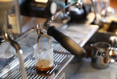 Close-up of coffee cup on table in cafe