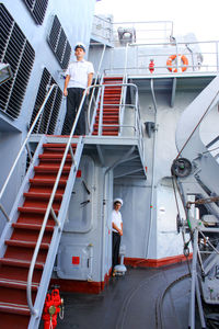 People working on staircase