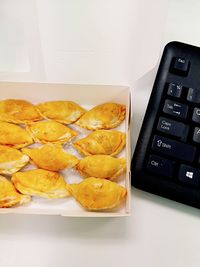 High angle view of fruits in plate on table