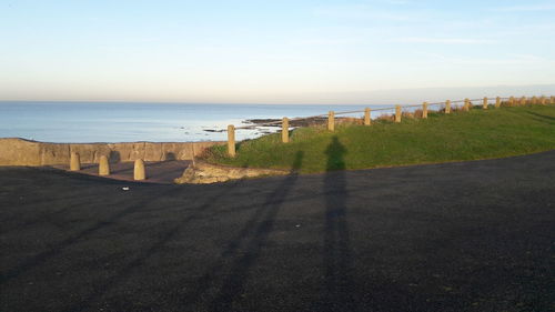 Scenic view of beach against clear sky