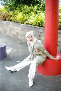 Rear view of young woman hijab standing in park