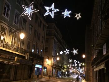 Illuminated street light at night