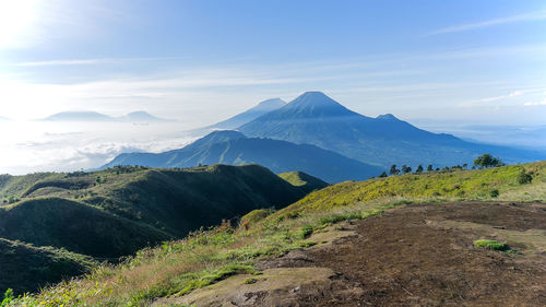 View of mountain range against cloudy sky