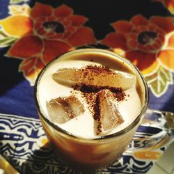 Close-up of coffee cup on table