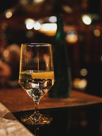 Close-up of beer glass on table