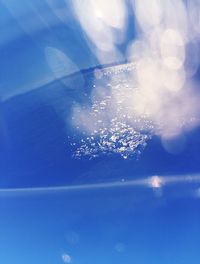 Close-up of water against blue sky