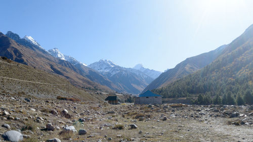 Scenic view of snowcapped mountains against sky