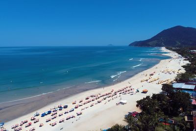 High angle view of beach against clear blue sky