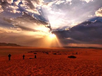 Scenic view of sunset over land