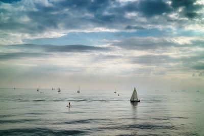 Scenic view of sea against cloudy sky