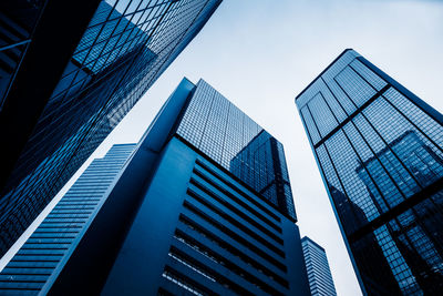 Low angle view of modern buildings against clear sky