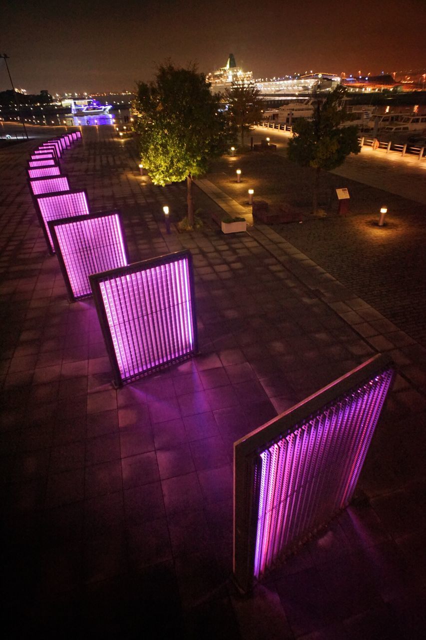 illuminated, night, chair, no people, built structure, outdoors