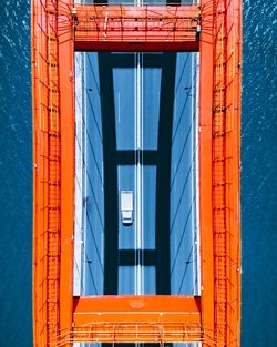 Low angle view of illuminated orange building