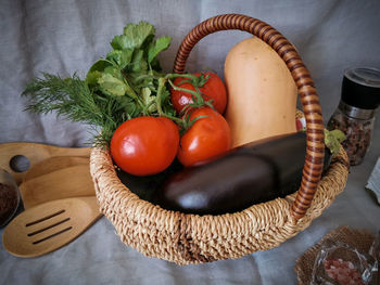 High angle view of fruits in basket on table